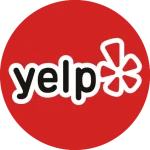 The Yelp logo featuring the word "yelp" in lowercase white letters with a black outline on a red circle background, accompanied by a stylized burst design on the right side.